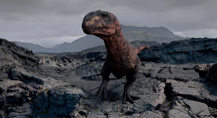A CGI dinosaur stands on a rocky field.