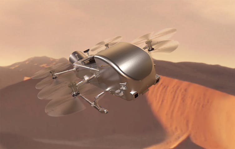 CGI image of a silver drone with eight propellers over the Martian surface