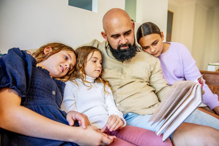Multigenerational Aboriginal Family spends time together in the family home