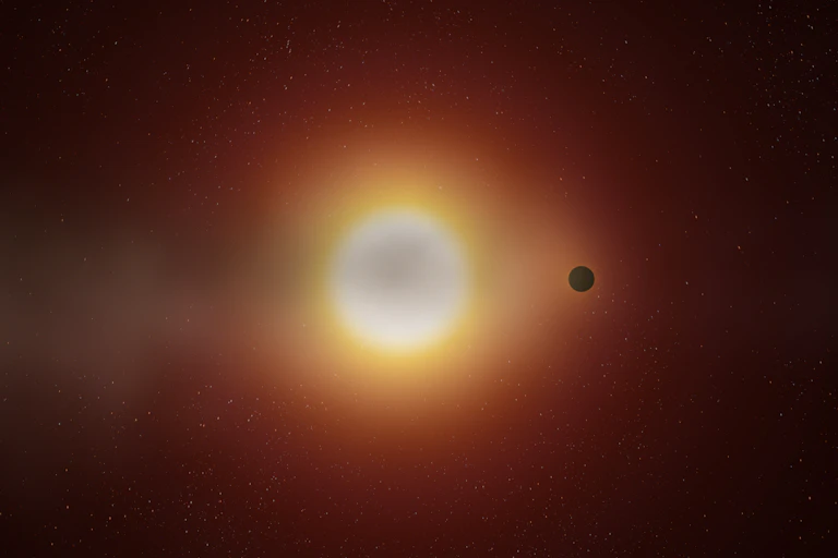 A small planet orbiting around a sun.