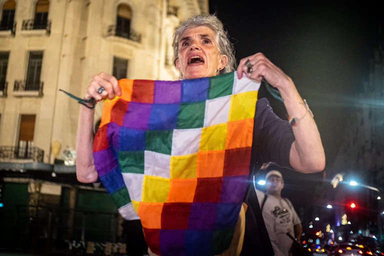 Woman with colourful flag