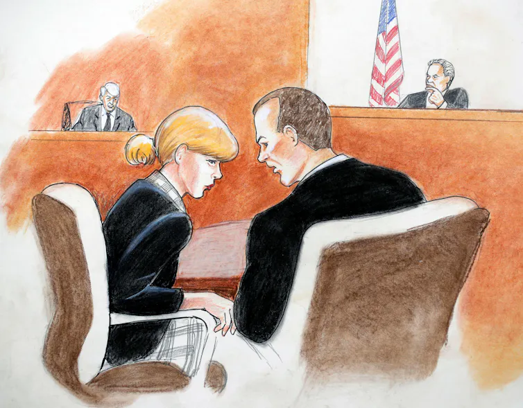 Courtroom sketch of Taylor Swift conferring with her attorney at a civil trial in 2017.