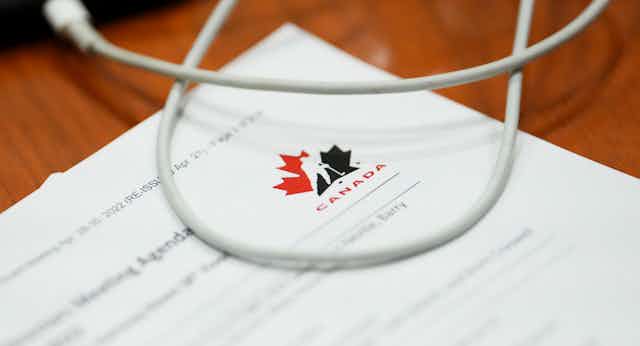a document showing the Hockey Canada logo, a silhouetted hockey player against a red and black maple leaf