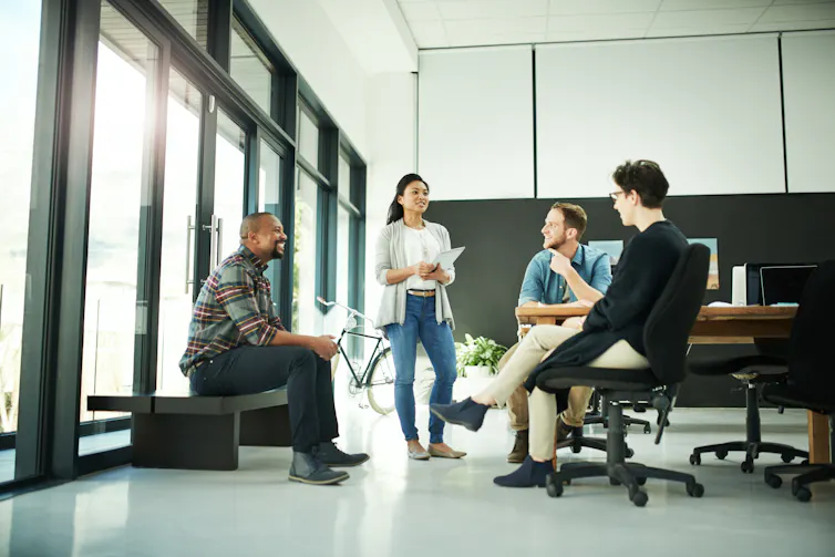 Team of designers brainstorming together in an office