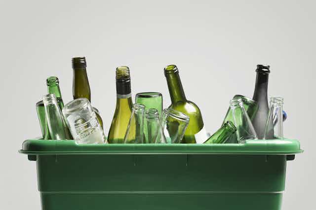 Empty booze bottles in a recycle bin