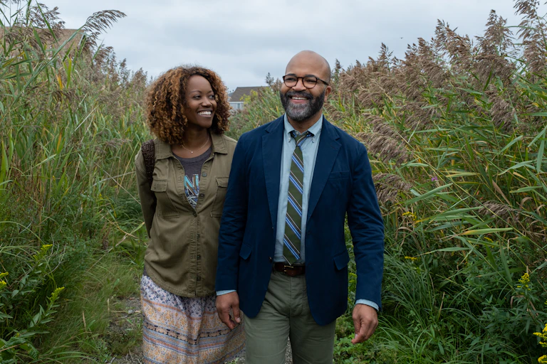 Thelonius Ellison and his girlfriend walk through rushes.