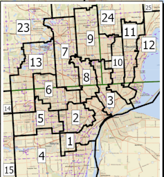 A taupe map is blocked with black lines and boxes numbered 1 to 24.