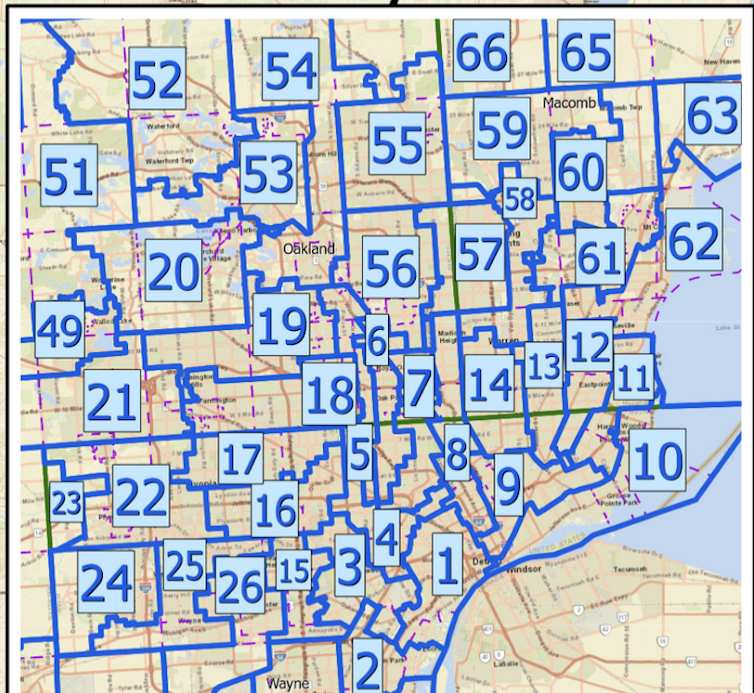 A partial map of Michigan shows an irregular pattern of voting districts with numerical labels.