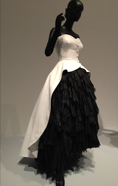 A cream and black silk and organza evening dress.