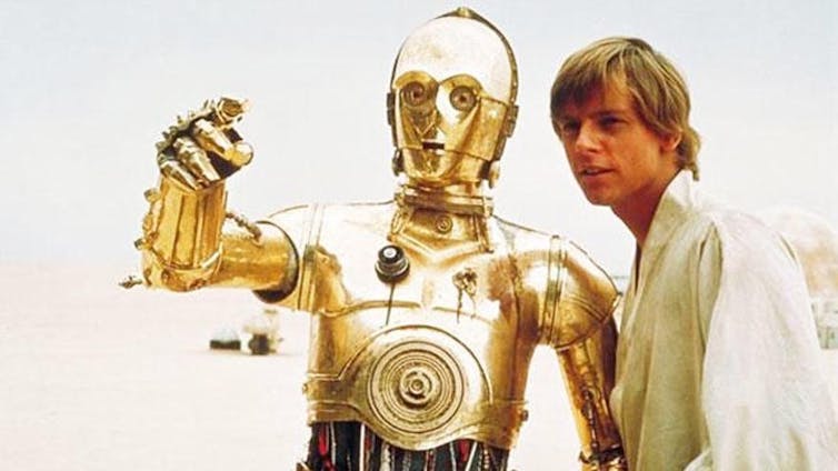 C-3PO hablando con Luke