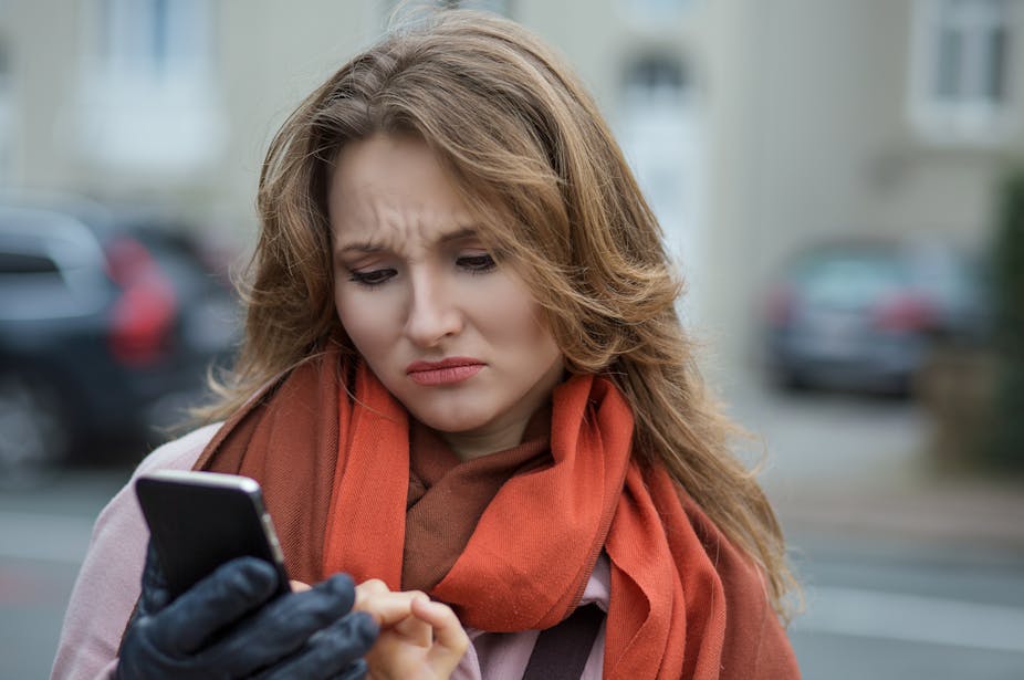 angry young woman on her phone