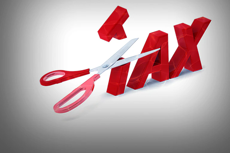 The word tax in large red letter with the t cut in half to represent tax cuts