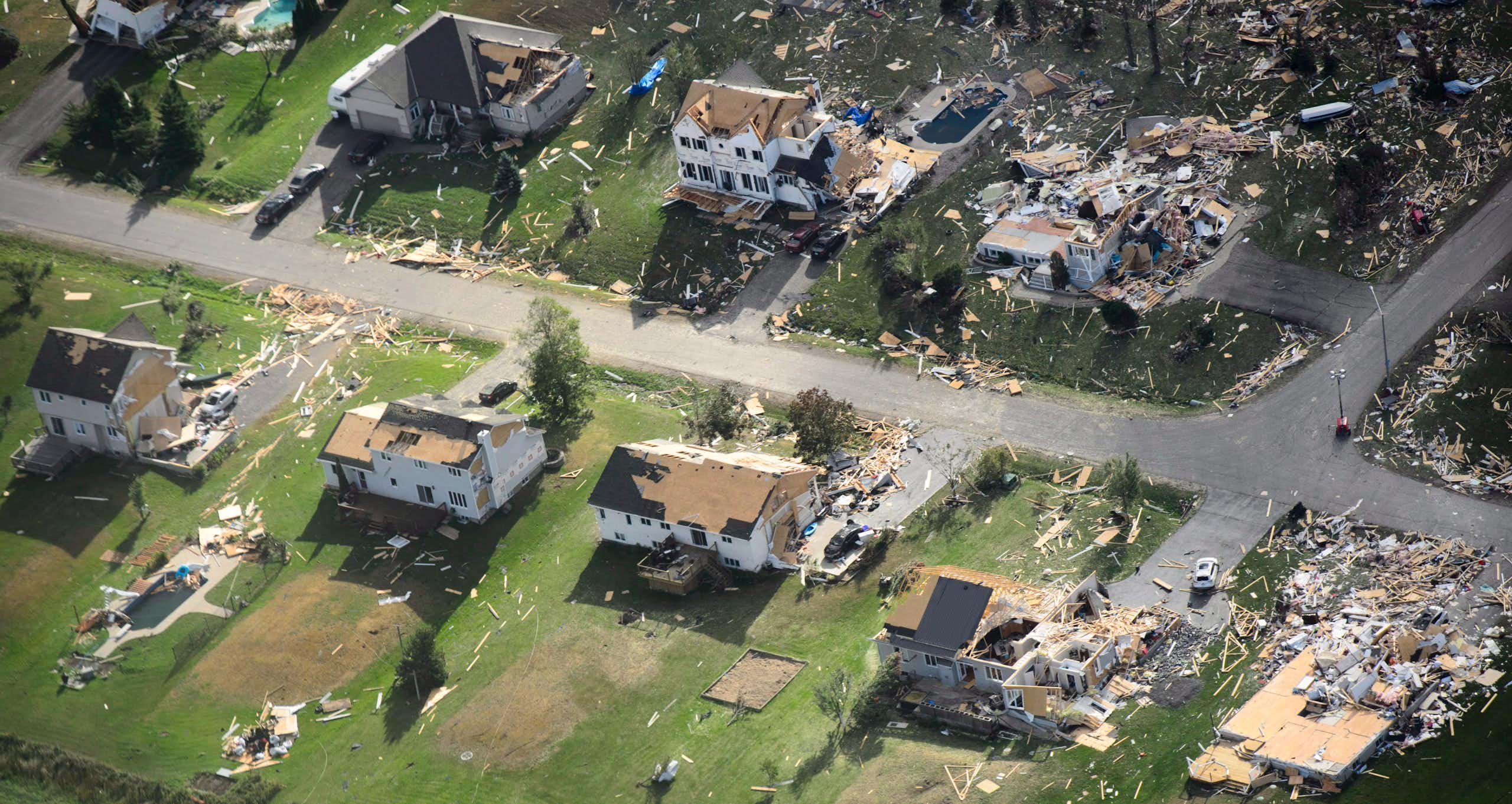 An aerial view of destroyed houses.