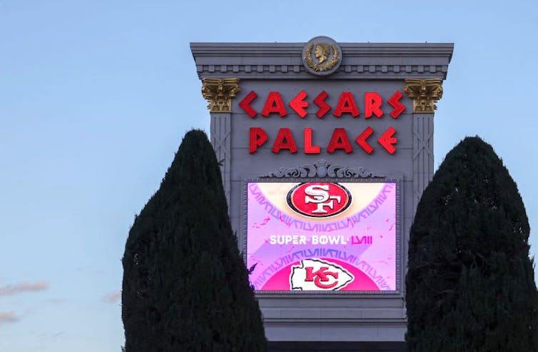 Caesar's Palace video screen advertising Super Bowl matchup between the San Francisco 49ers and the Kansas City Chiefs.
