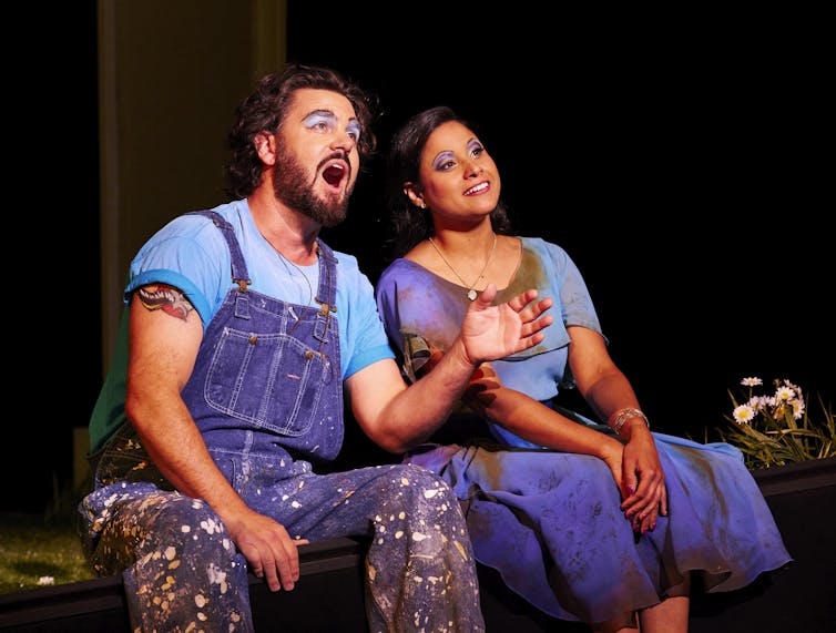 Ben Mingay and Stacey Alleaume are on stage, playing the characters of Papageno and Pamina.