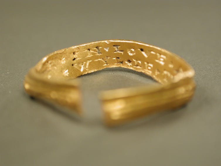 Gold ring with inscription inside