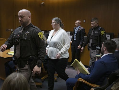 Michigan mother convicted of manslaughter for school shootings by her son – after buying him a gun and letting him keep it unsecured