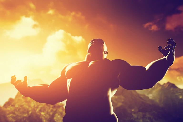 Image of an extremely muscular man wearing no shirt looking upwards.