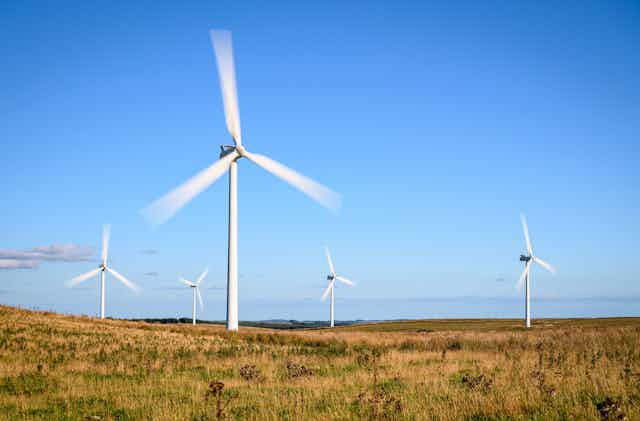wind farm turbines turning