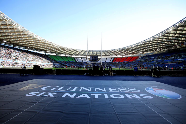 A wide shot at the Stadio Olimpico in Roma where the words 'Guinness Six Nations' is emblazoned on the field.