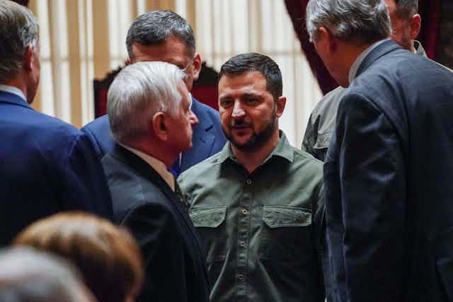 Ukrainian president Volodymyr Zelensky in a huddle with US senators in September 2023 to talk about backing for an aid bill for Ukraine. 