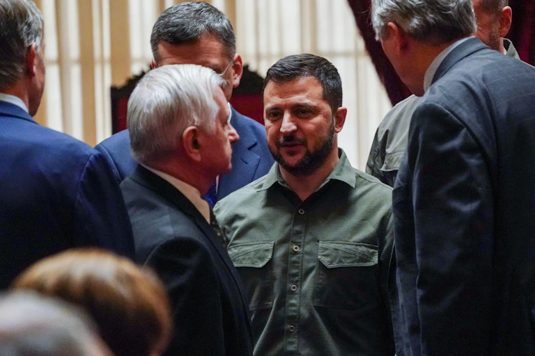 Ukrainian president Volodymyr Zelensky in a huddle with US senators in September 2023 to talk about backing for an aid bill for Ukraine.