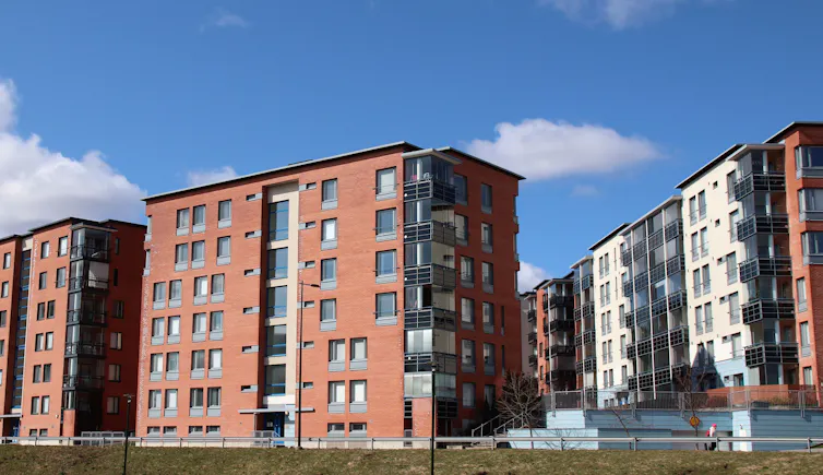 A red brick apartment building.