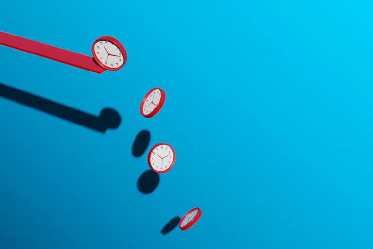 Five clocks falling from a red plank against a blue background.