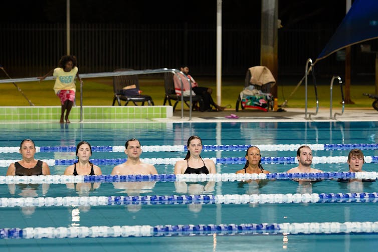 A line of swimmers.