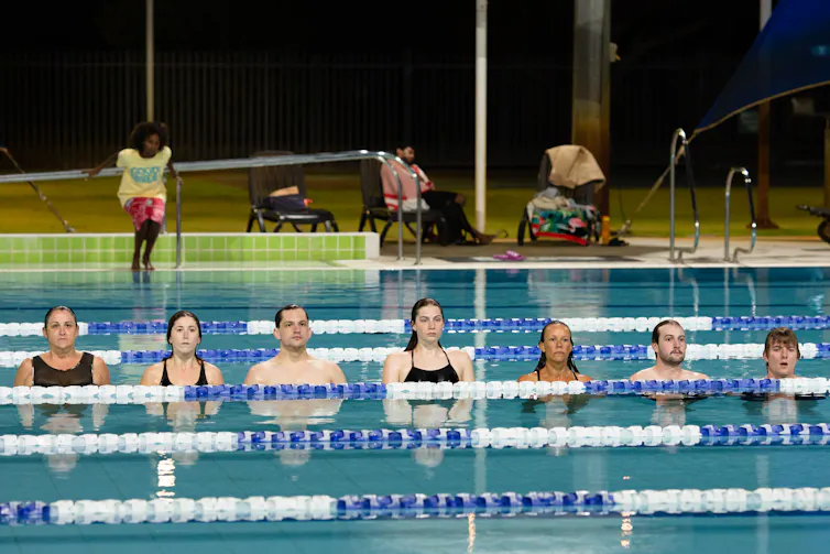 A line of swimmers.