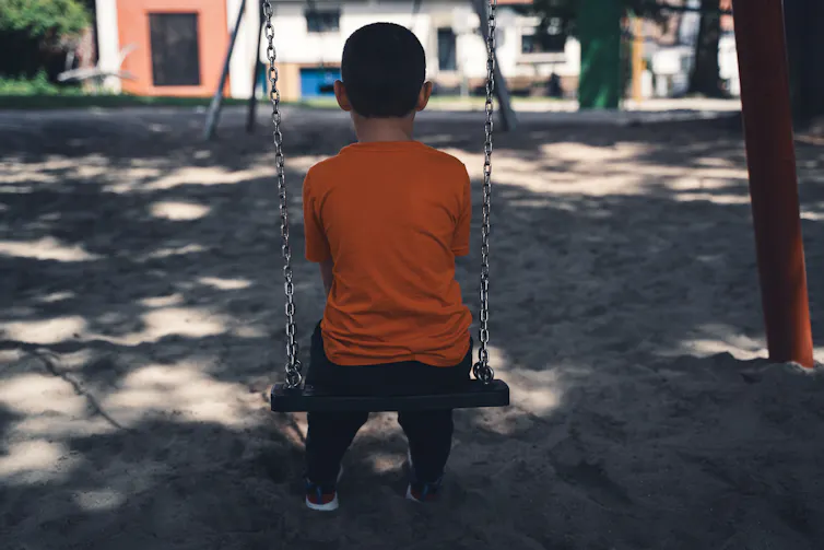 A student seen on a swing.