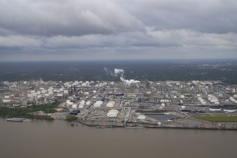 Aerial view of industrial buildings along a river