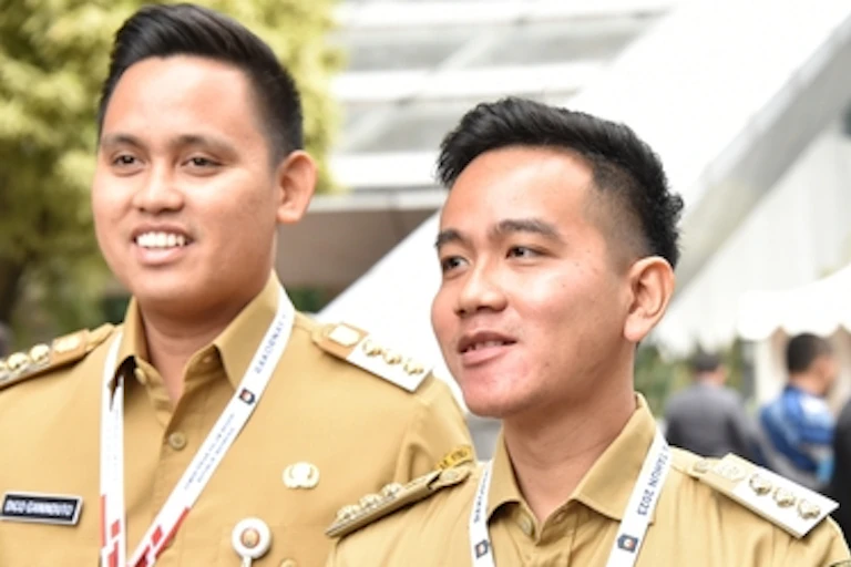 Gibran Rakabuming Raka, President Joko "Jokowi" Widodo's oldest son (right)