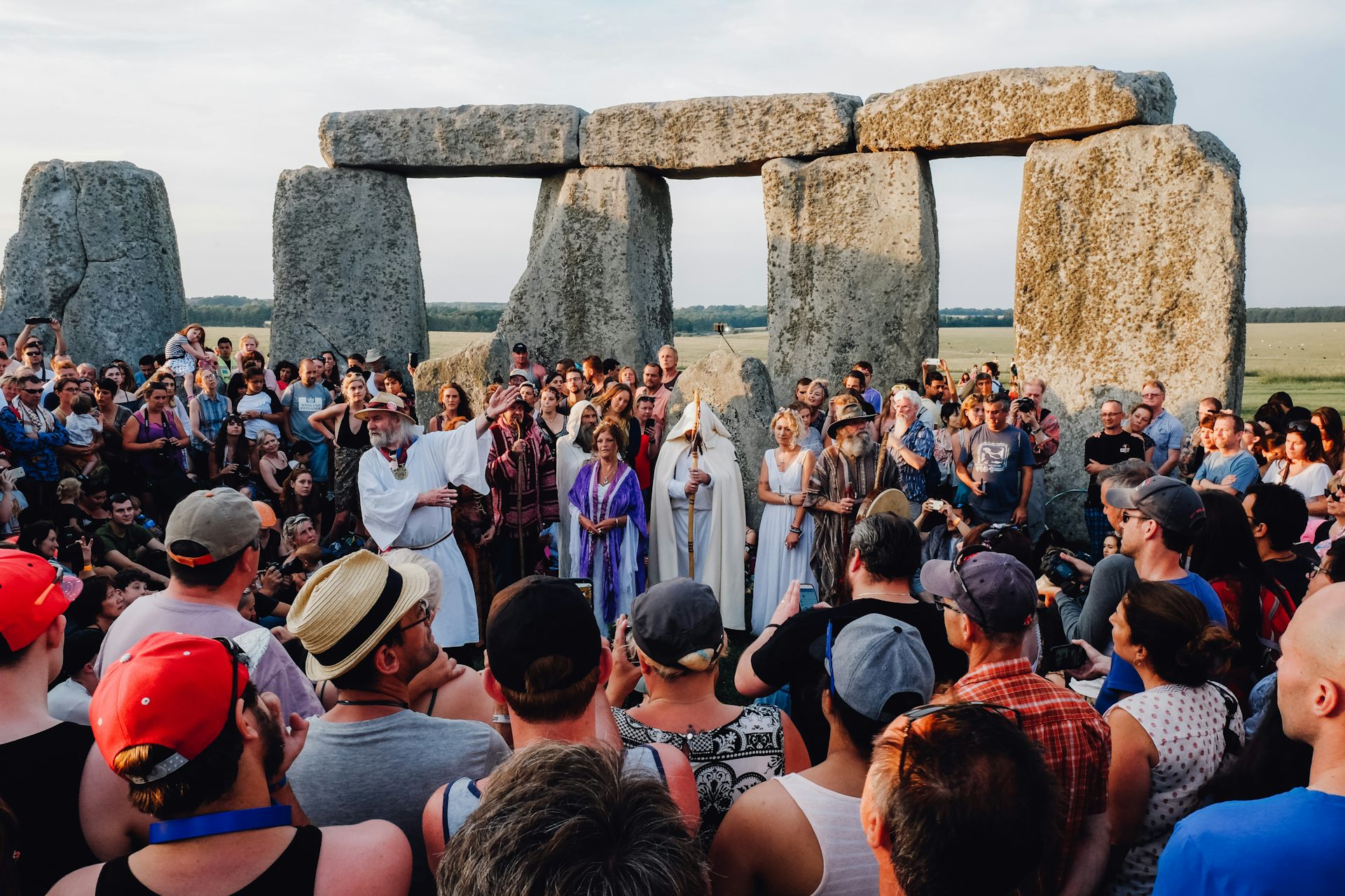 People celebrate solstice at Stonehenge