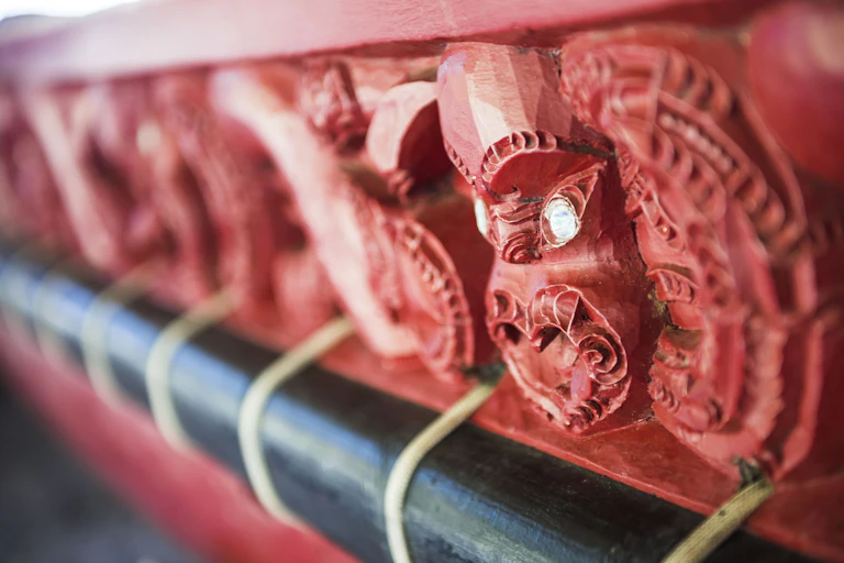 Wooden carving details on a Maori War Canoe,\ on the Waitangi Treaty Grounds,