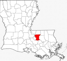 Black-and-white outline of Louisiana showing the parishes, with one, near the bottom right, filled in red