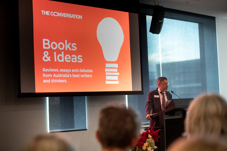 Photo of man giving speech at a launch event