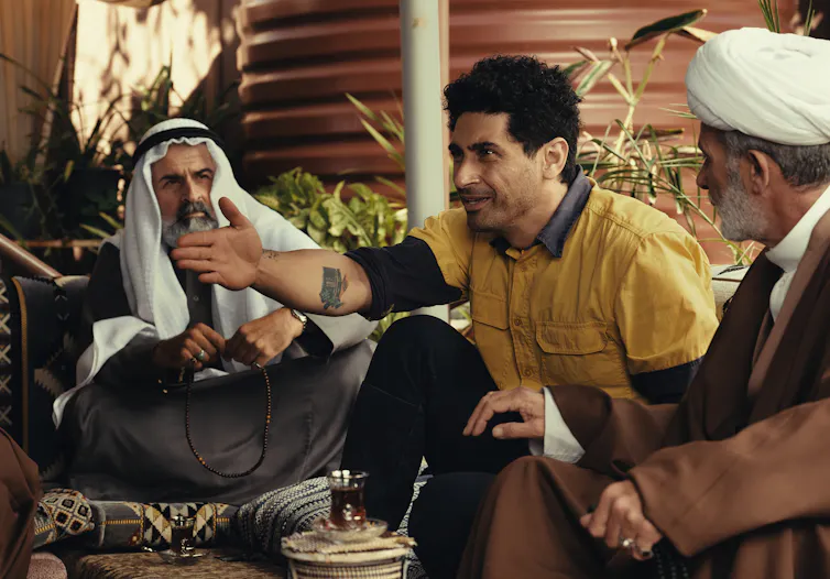 Three Muslim men.