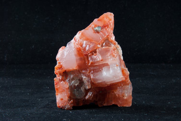 Small reddish lump of potash.