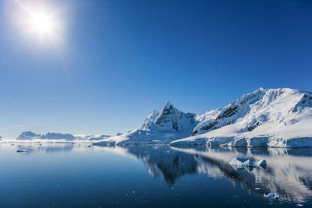 Antarctic coastline, icy mountains