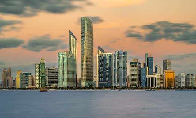 Abu Dhabi skyline with sea in foreground