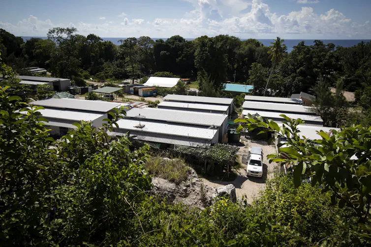 An aerial view of a series of rectangular buildings