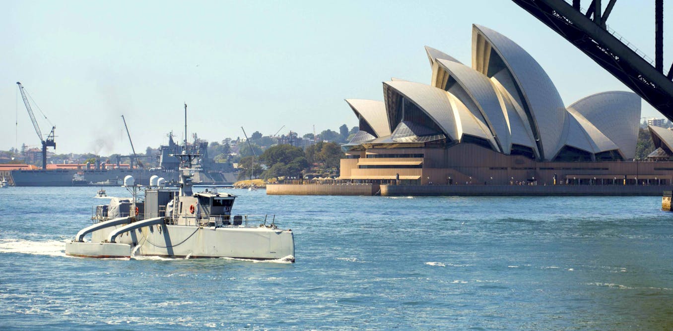 Australia wants navy boats with lots of weapons, but no crew. Will they run afoul of international law?