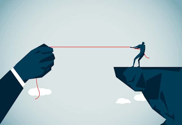 An illustration of a small human figure on the edge of a cliff pulling at a red string that's being held on the other end by a large, powerful hand