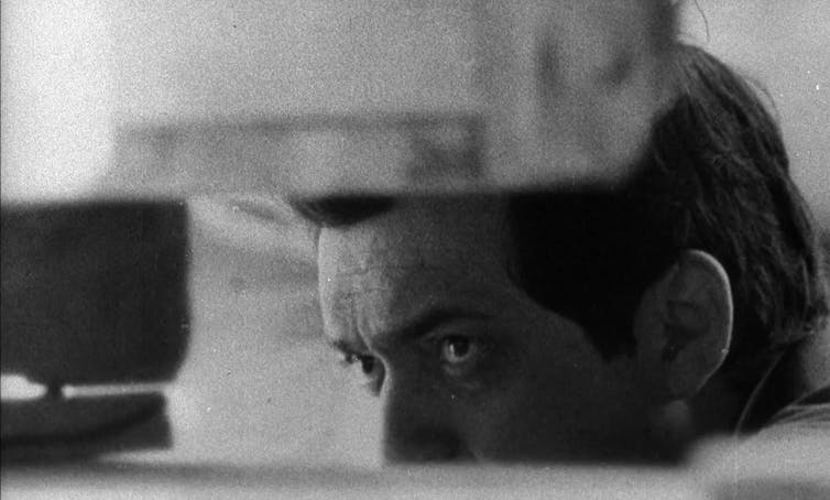 A black and white close up of Stanley Kubrick's face.
