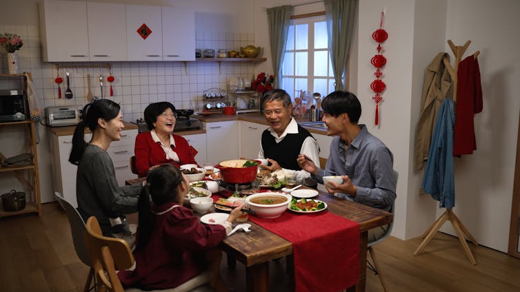 A multigenerational family at dinner.
