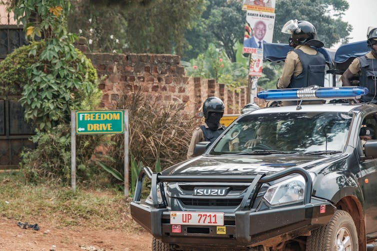 A police car outside a house.