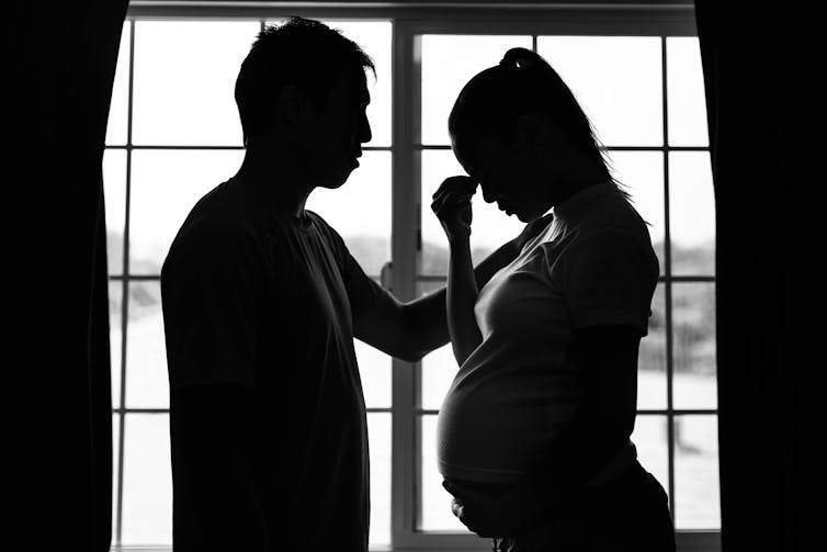 Worried couple, woman is pregnant