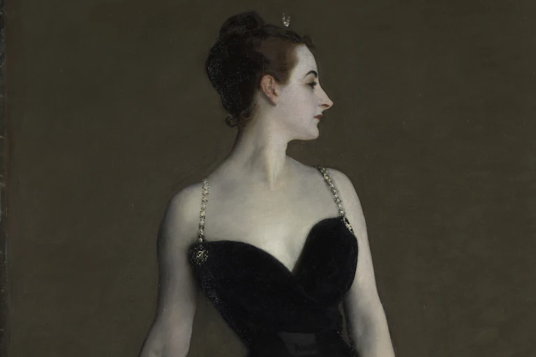 Madam X in a black dress.