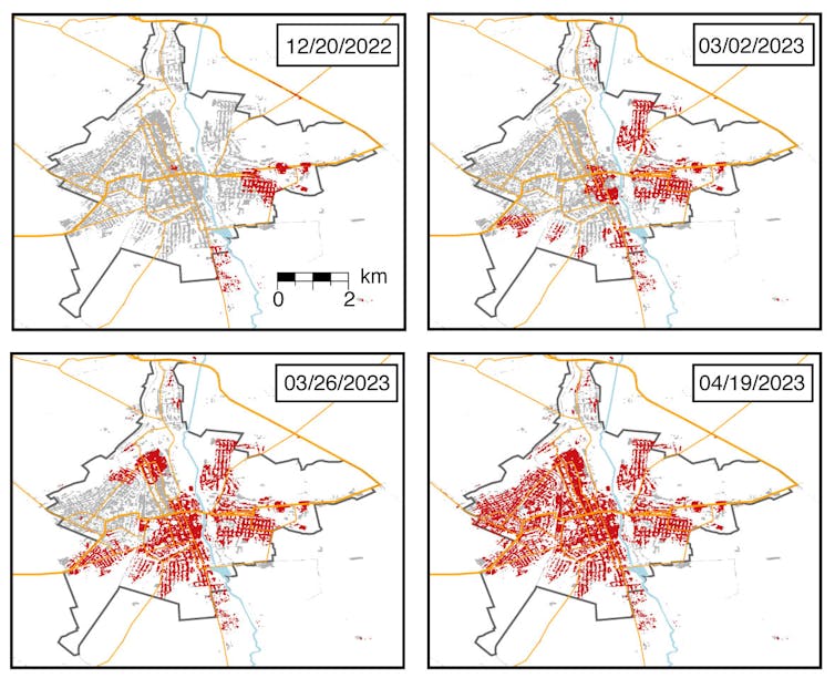 four maps of a city with increasing amounts of the buidlings marked in red